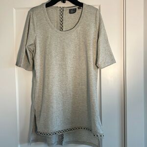 Strazzi small tan blouse. Good used condition with cute detailing on the back